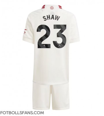 Manchester United Luke Shaw #23 Replika Tredje Tröja Barn 2023-24 Kortärmad (+ Korta byxor)